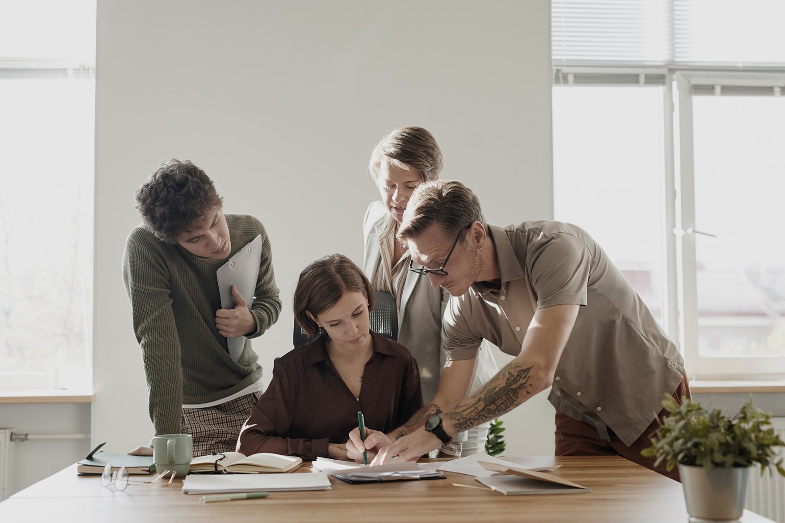 2business-team-working-on-project-in-office